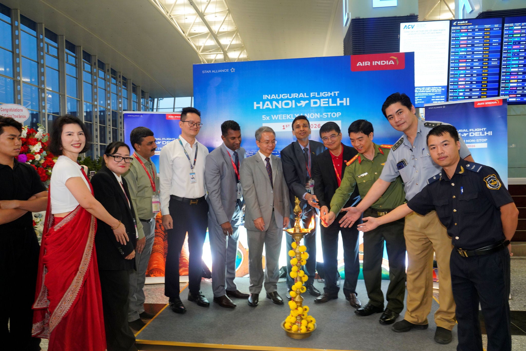 Dignitaries from the Indian Embassy in Vietnam and Hanoi Airport join the Air India team in celebrating the inaugural flight 