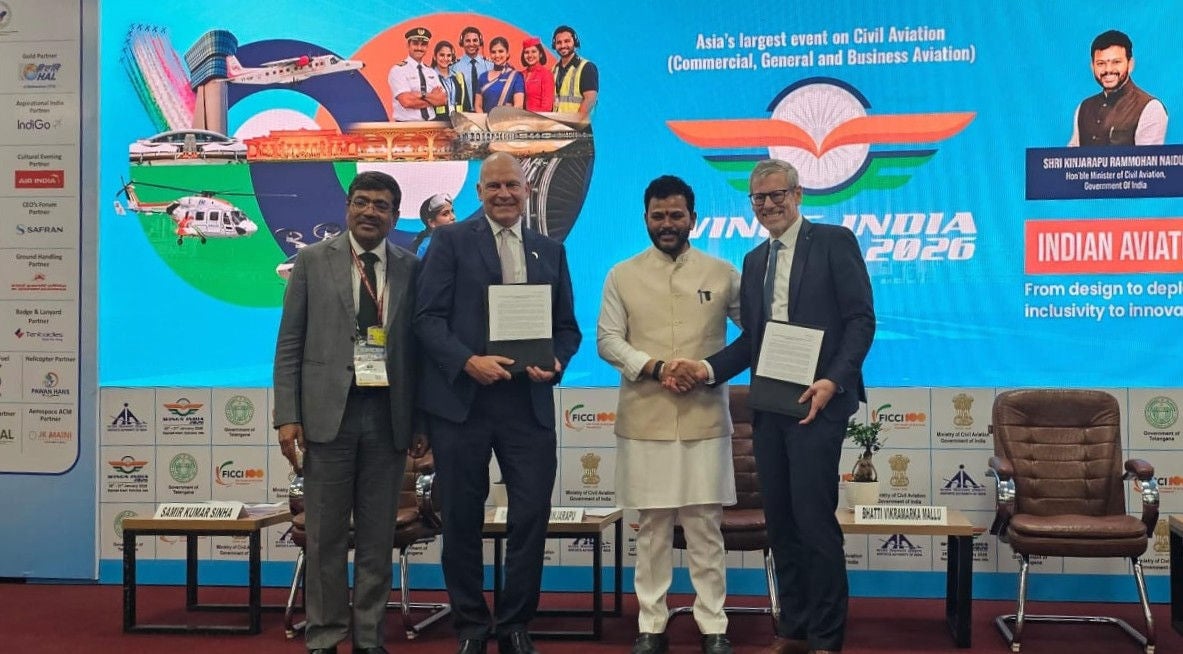 Campbell Wilson, CEO & MD Air India and Benoit de Saint-Exupéry, Airbus Executive Vice President of Commercial Aircraft Sales, on stage at Wings India 2026 with Honourable Minister of Civil Aviation, India, Kinjarapu Ram Mohan Naidu
