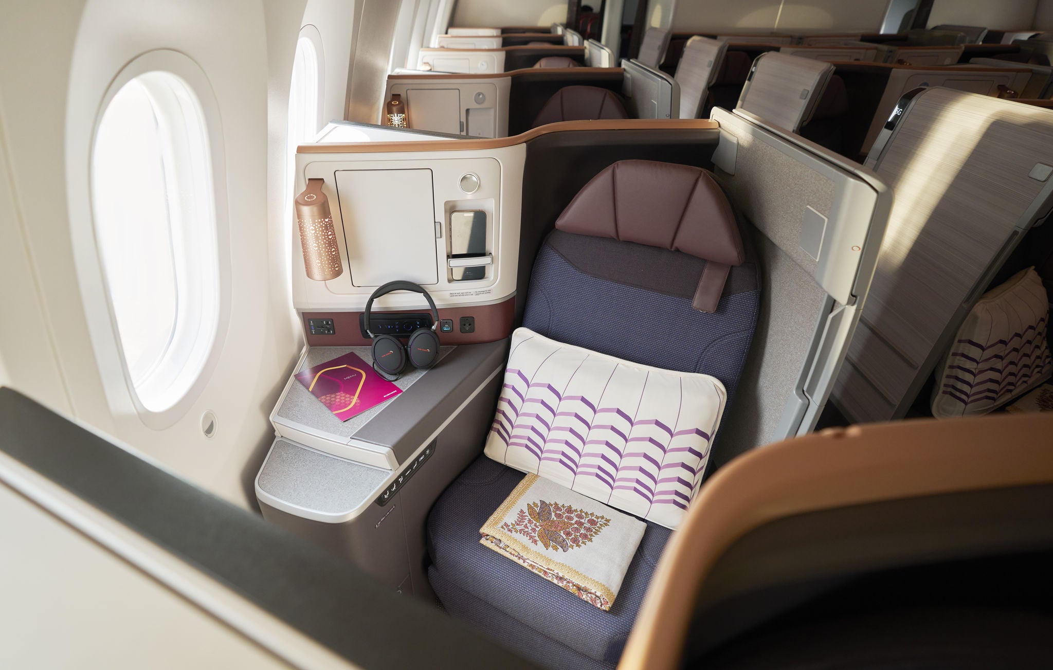 30 private cabins in business class with direct aisle access for all suites