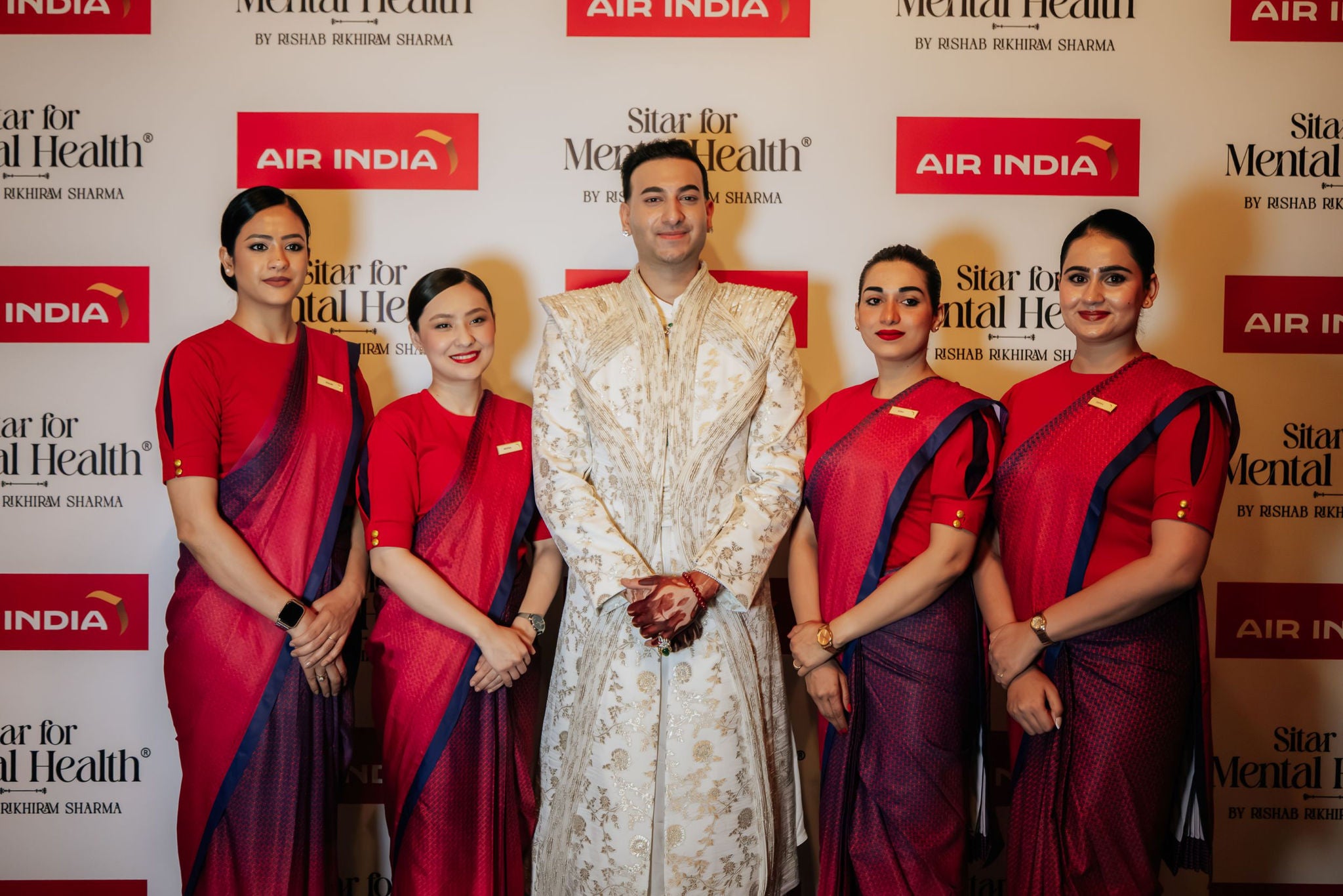Rishab Rikhiram Sharma with Crew Members of Air India